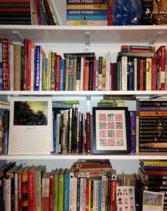 As bare as my bookshelf will ever get...